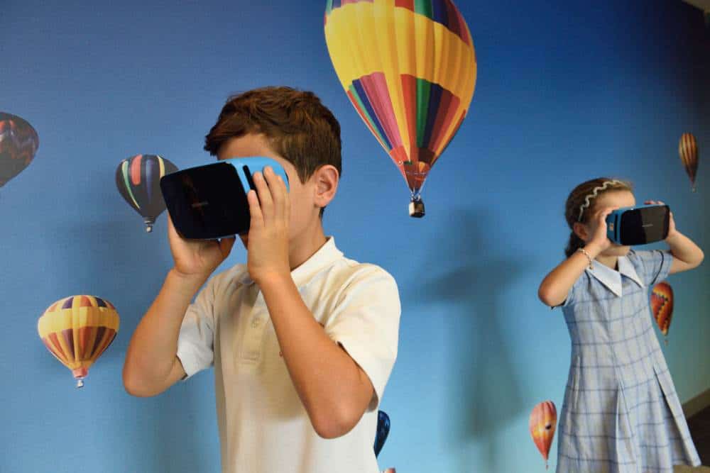 Children using VR Headsets for educational purposes