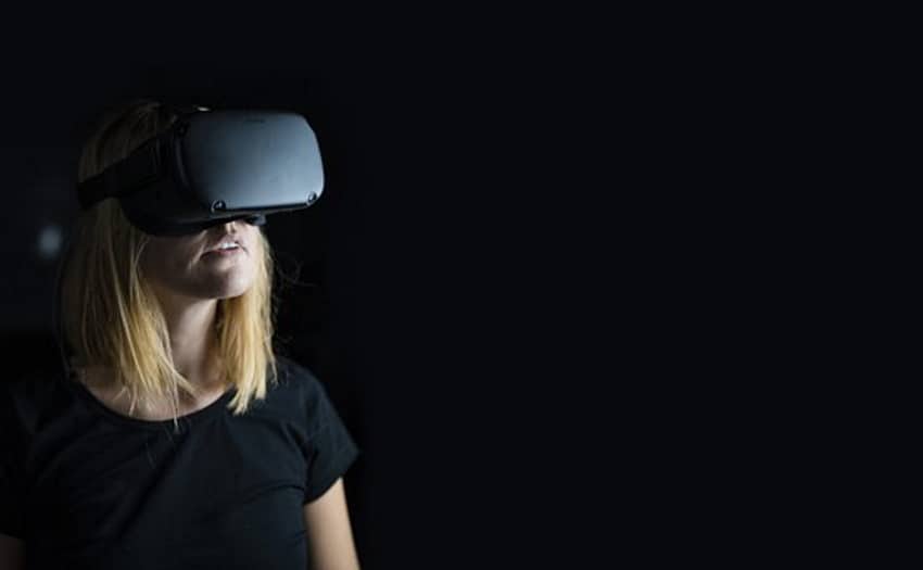 Woman Using Oculus Quest in the dark